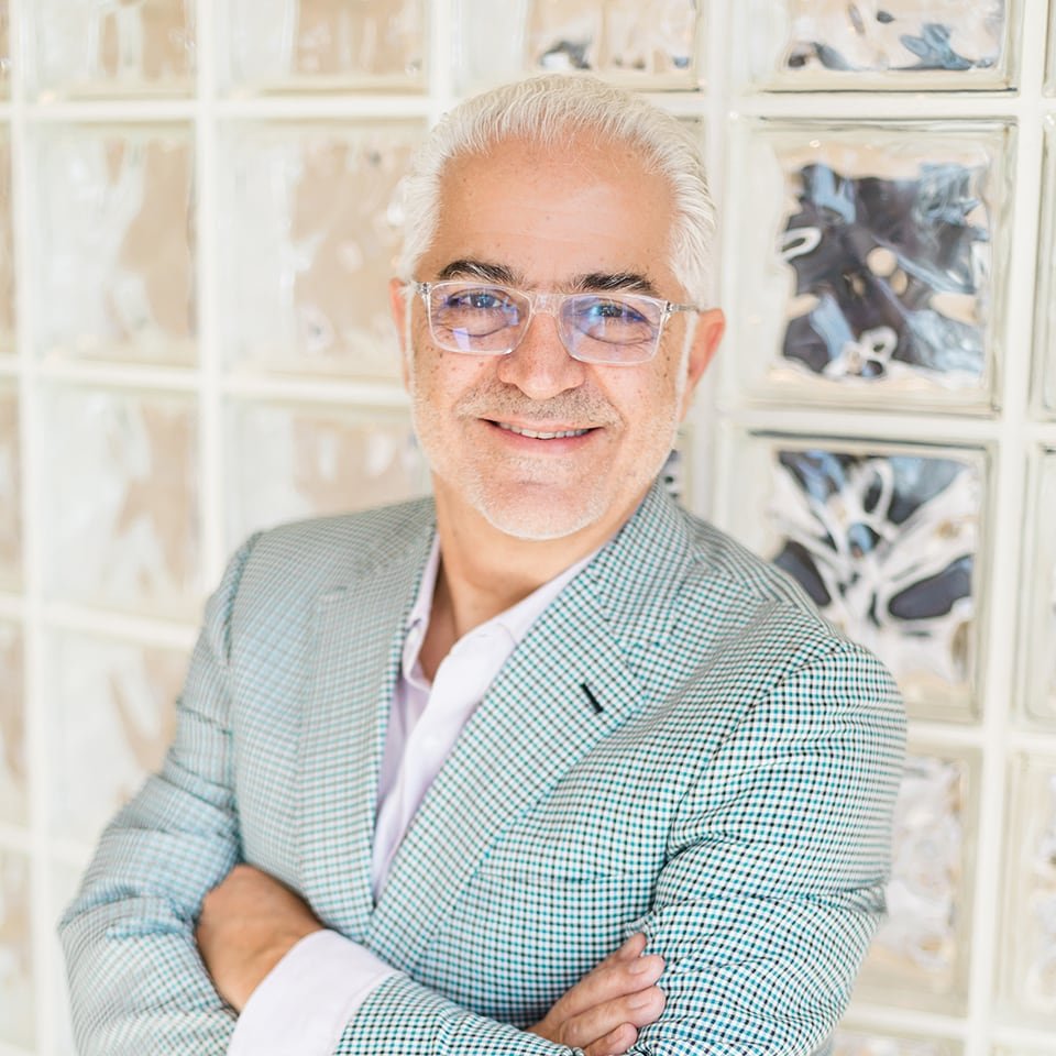 Dr. Ayman Hakki — board-certified plastic surgeon at Luxxery Boutique