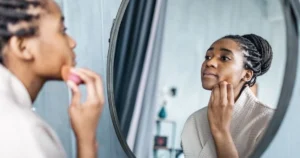 woman looking in the mirror